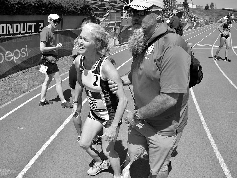 Three-time Olympic race walker Michelle Rohl, suffered from the heat at the end of her 800, but still won the W50 age group.