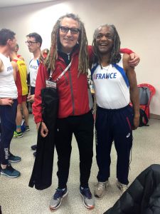 Shaggy Smith (left) compared dreadlocks with French athlete Thierry Zapha at 2017 Daegu indoor worlds.