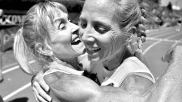 Lesley Hinz (left) hugs her friend Sue McDonald after Sue lowered her own W50 American record for the 800.