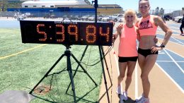 Lesley Hinz (with teammate Sue McDonald) shows off her latest mile world record.