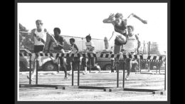 That's me leading a 4x120 shuttle low hurdle relay — going against the barrier in 1970.
