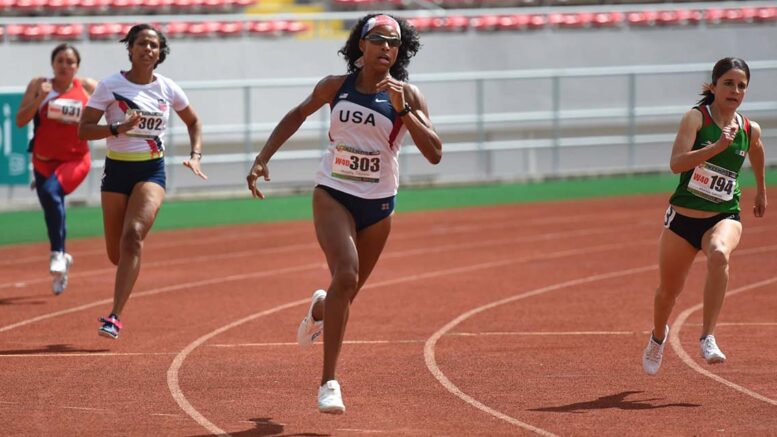 Toccata Murphy runs 200-meter dash as W40 in 2014.