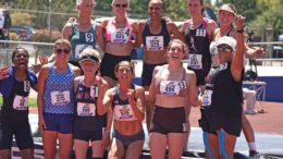 Neringa Jakstiene, (575) in front row, celebrates with fellow Ironlady pentathletes after her world record outing. Photo by Ken Stone